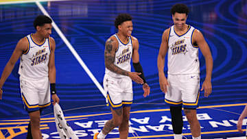 Feb 14, 2025; San Francisco, California, USA; Team C forward Ryan Dunn (0) of the Phoenix Suns, Team C guard Keyonte George (3) of the Utah Jazz,Team C forward Trayce Jackson-Davis (32) of the Golden State Warriors react after the 2025 NBA Rising Stars Game at Chase Center. Mandatory Credit: Cary Edmondson-Imagn Images