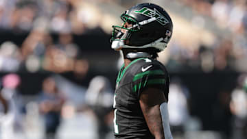 Oct 5, 2025; East Rutherford, New Jersey, USA; New York Jets cornerback Sauce Gardner (1) reacts after making a tackle against the Dallas Cowboys during the first half at MetLife Stadium. Mandatory Credit: Vincent Carchietta-Imagn Images
