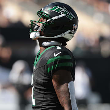 Oct 5, 2025; East Rutherford, New Jersey, USA; New York Jets cornerback Sauce Gardner (1) reacts after making a tackle against the Dallas Cowboys during the first half at MetLife Stadium. Mandatory Credit: Vincent Carchietta-Imagn Images