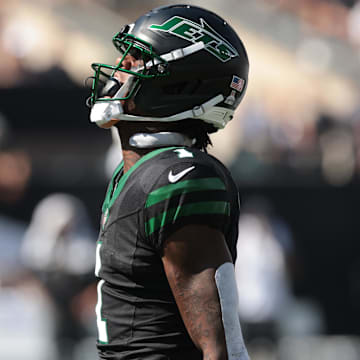 Oct 5, 2025; East Rutherford, New Jersey, USA; New York Jets cornerback Sauce Gardner (1) reacts after making a tackle against the Dallas Cowboys during the first half at MetLife Stadium. Mandatory Credit: Vincent Carchietta-Imagn Images