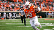Aug 28, 2025; Stillwater, Oklahoma, USA; Oklahoma State Cowboys quarterback Hauss Hejny (8) runs the ball during the first half against the Tennessee Martin Skyhawks at Boone Pickens Stadium. Mandatory Credit: William Purnell-Imagn Images