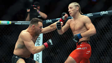 Michael Chandler fights against Paddy Pimblett during UFC 314 at Kaseya Center. 