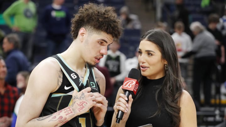 Feb 24, 2023; Minneapolis, Minnesota, USA; Charlotte Hornets guard LaMelo Ball (1) conducts an interview with Ashley ShahAhmadi after the game against the Minnesota Timberwolves at Target Center. Mandatory Credit: Bruce Kluckhohn-USA TODAY Sports