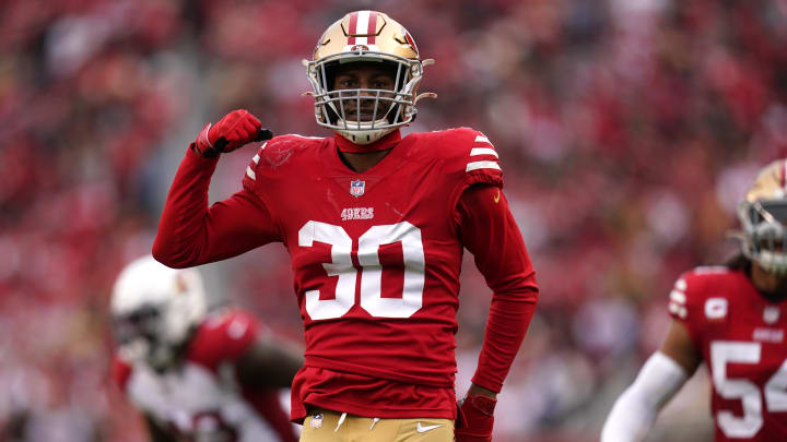 Jan 8, 2023; Santa Clara, California, USA; San Francisco 49ers safety George Odum (30) reacts after making a tackle on a kickoff return against the Arizona Cardinals in the third quarter at Levi's Stadium. Mandatory Credit: Cary Edmondson-USA TODAY Sports