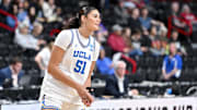 Mar 30, 2025; Spokane, WA, USA; UCLA Bruins center Lauren Betts (51) stretches before a the Elite 8 NCAA Tournament basketball game against the LSU Lady Tigers at Spokane Arena. Mandatory Credit: James Snook-Imagn Images
