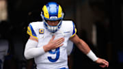 Nov 30, 2025; Charlotte, North Carolina, USA; Los Angeles Rams quarterback Matthew Stafford (9) takes the field before the game against the Carolina Panthers at Bank of America Stadium. Mandatory Credit: Scott Kinser-Imagn Images