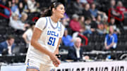 Mar 30, 2025; Spokane, WA, USA; UCLA Bruins center Lauren Betts (51) stretches before a the Elite 8 NCAA Tournament basketball game against the LSU Lady Tigers at Spokane Arena.