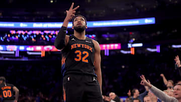 Nov 14, 2025; New York, New York, USA; New York Knicks center Karl-Anthony Towns (32) celebrates his three point shot against the Miami Heat during the first quarter at Madison Square Garden. Mandatory Credit: Brad Penner-Imagn Images