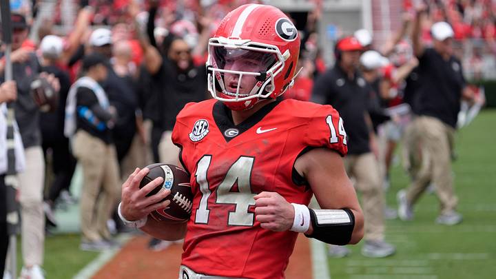 Georgia quarterback Gunner Stockton (14) runs in for another touchdown during the first half of a NCAA college football game against Kentucky in Athens, Ga., on Saturday, October 4, 2025.