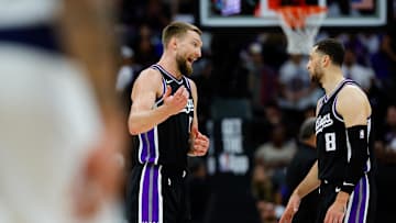 Apr 16, 2025; Sacramento, California, USA; Sacramento Kings forward Domantas Sabonis (11) talks with guard Zach LaVine (8) during the second quarter against the Dallas Mavericks at Golden 1 Center. Mandatory Credit: Sergio Estrada-Imagn Images