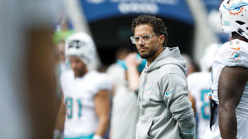 Sep 22, 2024; Seattle, Washington, USA; Miami Dolphins head coach Mike McDaniel watches pregame warmups against the Seattle Seahawks at Lumen Field.