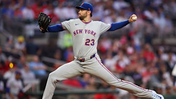 Jun 17, 2025; Atlanta, Georgia, USA; New York Mets starting pitcher David Peterson (23) throws against the Atlanta Braves in the first inning at Truist Park. Mandatory Credit: Brett Davis-Imagn Images