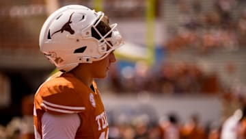 Texas football player, Arch Manning, stands on the field during warm up before a game against UTEP at Darrell K Royal–Texas Memorial Stadium in Austin