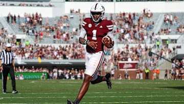 Nov 8, 2025; Starkville, Mississippi, USA; Mississippi State Bulldogs quarterback Kamario Taylor (1) runs for a touchdown against the Georgia Bulldogs during the second half at Davis Wade Stadium at Scott Field. Mandatory Credit: Wesley Hale-Imagn Images