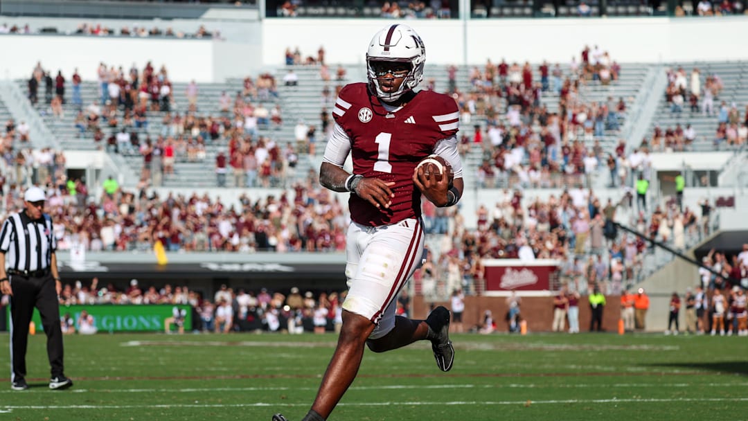 Nov 8, 2025; Starkville, Mississippi, USA; Mississippi State Bulldogs quarterback Kamario Taylor (1) runs for a touchdown against the Georgia Bulldogs during the second half at Davis Wade Stadium at Scott Field. Mandatory Credit: Wesley Hale-Imagn Images