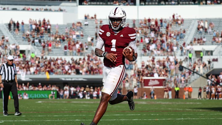 Nov 8, 2025; Starkville, Mississippi, USA; Mississippi State Bulldogs quarterback Kamario Taylor (1) runs for a touchdown against the Georgia Bulldogs during the second half at Davis Wade Stadium at Scott Field. Mandatory Credit: Wesley Hale-Imagn Images