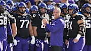 Nov 29, 2025; Fort Worth, Texas, USA; TCU Horned Frogs head coach Sonny Dykes looks on with his team before the game against the Cincinnati Bearcats at Amon G. Carter Stadium. Mandatory Credit: Jerome Miron-Imagn Images
