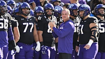 Nov 29, 2025; Fort Worth, Texas, USA; TCU Horned Frogs head coach Sonny Dykes looks on with his team before the game against the Cincinnati Bearcats at Amon G. Carter Stadium. Mandatory Credit: Jerome Miron-Imagn Images