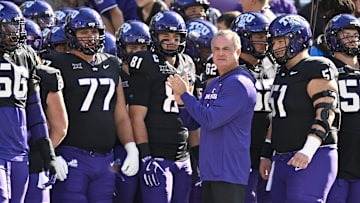 Nov 29, 2025; Fort Worth, Texas, USA; TCU Horned Frogs head coach Sonny Dykes looks on with his team before the game against the Cincinnati Bearcats at Amon G. Carter Stadium. Mandatory Credit: Jerome Miron-Imagn Images