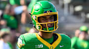 Aug 31, 2024; Eugene, Oregon, USA; Oregon Ducks quarterback Dante Moore (5) during pregame warmups before the game against the Idaho Vandals at Autzen Stadium. Mandatory Credit: Craig Strobeck-Imagn Images
