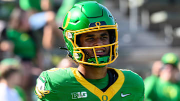Aug 31, 2024; Eugene, Oregon, USA; Oregon Ducks quarterback Dante Moore (5) during pregame warmups before the game against the Idaho Vandals at Autzen Stadium. Mandatory Credit: Craig Strobeck-Imagn Images
