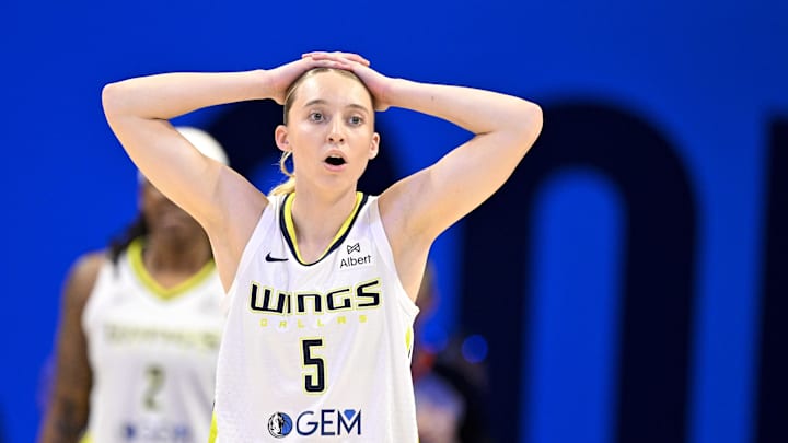Sep 11, 2025; Arlington, Texas, USA; Dallas Wings guard Paige Bueckers (5) reacts to a call during the first half against the Phoenix Mercury at College Park Center. Mandatory Credit: Jerome Miron-Imagn Images