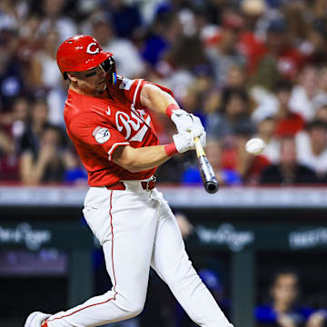 Jul 30, 2025; Cincinnati, Ohio, USA; Cincinnati Reds first baseman Spencer Steer (7) hits a two-run triple in the eighth inning against the Los Angeles Dodgers at Great American Ball Park. Mandatory Credit: Katie Stratman-Imagn Images