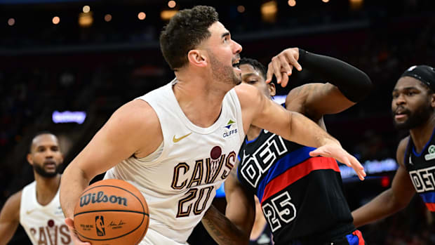 January 27, 2025; Cleveland, Ohio, United States; The Cleveland striker Georges Niang (20) goes to the basket against Detroit Pisto