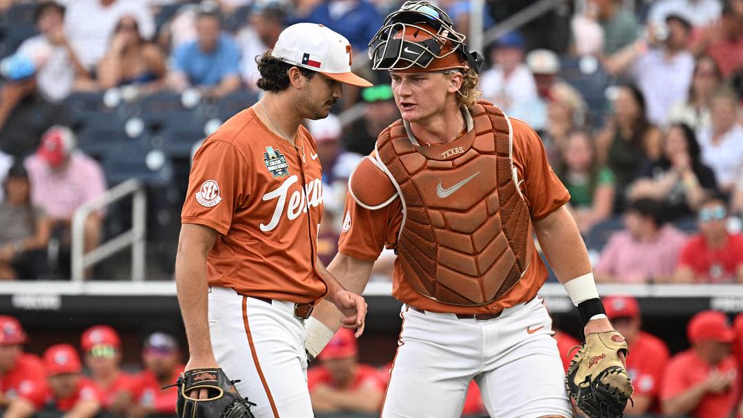 Jun 16, 2026; Omaha, NE, USA; Texas Longhorns starting pitcher Luke Harrison (53) and Texas Longhorns catcher Carson Tinney (8) walk off the field after the first inning against the Georgia Bulldogs at Charles Schwab Field. Mandatory Credit: Steven Branscombe-Imagn Images Jun 16, 2026; Omaha, NE, USA; Texas Longhorns starting pitcher Luke Harrison (53) and Texas Longhorns catcher Carson Tinney (8) walk off the field after the first inning against the Georgia Bulldogs at Charles Schwab Field. Mandatory Credit: Steven Branscombe-Imagn Images