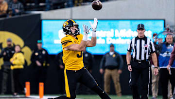 Iowa defensive back Cooper DeJean (3) catches a punt at Kinnick Stadium on Saturday, October 21, 2023 in Iowa City. DeJean returned the punt for a touchdown and it was later called back after review ruled he fair-caught the punt.