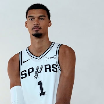 Sep 29, 2025; San Antonio, TX, USA; San Antonio Spurs forward-center Victor Wembanyama (1) poses for photos during Media Day at Victory Capital Performance Center in San Antonio.