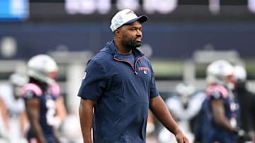 Aug 15, 2024; Foxborough, Massachusetts, USA; New England Patriots head coach Jerod Mayo walks onto the field before a game against the Philadelphia Eagles at Gillette Stadium. Mandatory Credit: Brian Fluharty-Imagn Images
