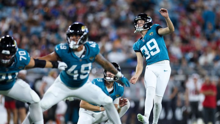 Aug 17, 2024; Jacksonville, Florida, USA; Jacksonville Jaguars kicker Cam Little (39) kicks a extra point against the Tampa Bay Buccaneers in the second quarter during a preseason game at EverBank Stadium. 