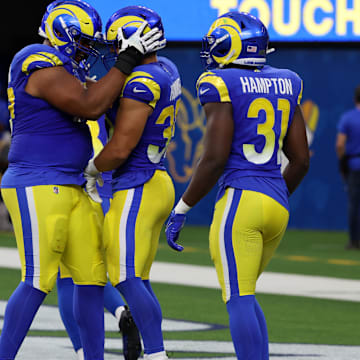 Aug 19, 2023; Inglewood, California, USA;  Los Angeles Rams linebacker Jake Hummel (35) celebrates with teammates after scoring a touchdown on interception during the second quarter against the Las Vegas Raiders at SoFi Stadium. Mandatory Credit: Kiyoshi Mio-USA TODAY Sports