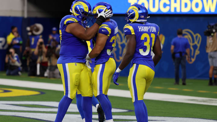 Aug 19, 2023; Inglewood, California, USA;  Los Angeles Rams linebacker Jake Hummel (35) celebrates with teammates after scoring a touchdown on interception during the second quarter against the Las Vegas Raiders at SoFi Stadium. Mandatory Credit: Kiyoshi Mio-USA TODAY Sports