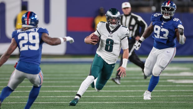 East Rutherford, New Jersey, USA; Philadelphia Eagles quarterback Marcus Mariota (8) carries the ball as New York Giants 