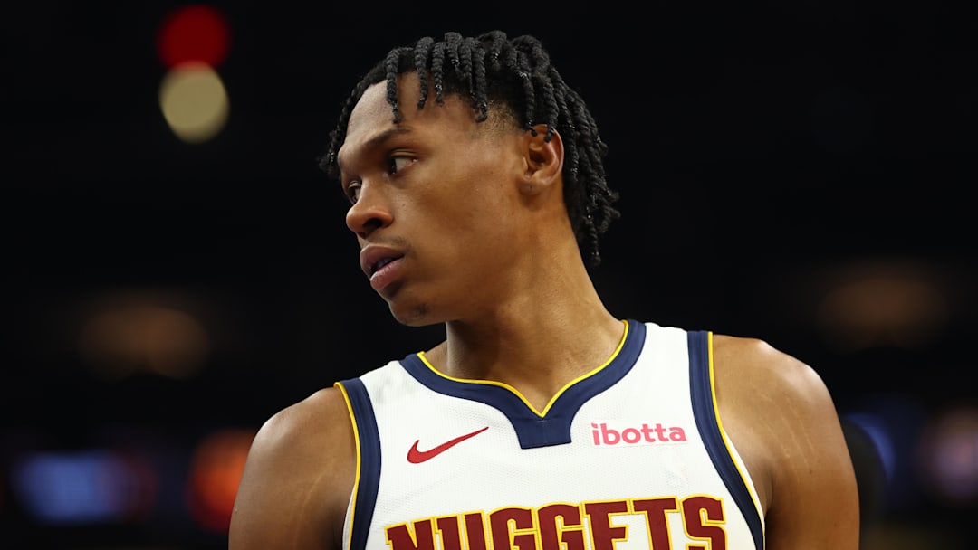 Nov 29, 2025; Phoenix, Arizona, USA; Denver Nuggets guard Peyton Watson (8) against the Phoenix Suns at the Mortgage Matchup Center.