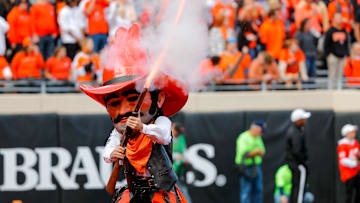 Oct 14, 2023; Stillwater, Oklahoma, USA; Oklahoma State Cowboys mascot Pistol Pete shoots a shotgun during a game between Oklahoma State and Kansas at Boone Pickens Stadium. Mandatory Credit: Nathan J. Fish-Imagn Images