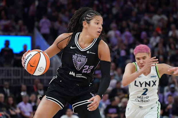 Golden State Valkyries guard Veronica Burton dribbles upcourt past Minnesota Lynx guard Natisha Hiedeman.