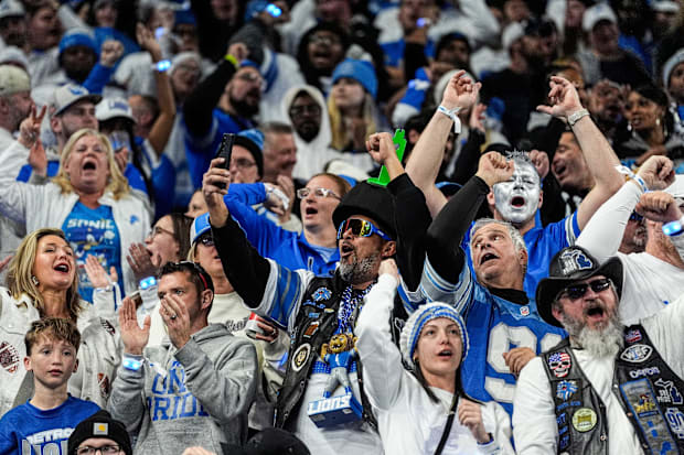 Lions fans cheer in the stands