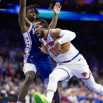 May 2, 2024; Philadelphia, Pennsylvania, USA; New York Knicks guard Jalen Brunson (11) drives against Philadelphia 76ers guard Tyrese Maxey (0) during the first half of game six of the first round for the 2024 NBA playoffs at Wells Fargo Center. Mandatory Credit: Bill Streicher-Imagn Images