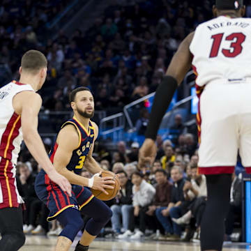 guard Stephen Curry (30) looks to shoot against the Miami Heat during the fourth quarter at Chase Center. Mandatory Credit: John Hefti-Imagn Images