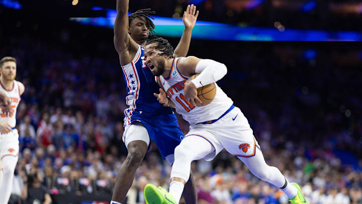 May 2, 2024; Philadelphia, Pennsylvania, USA; New York Knicks guard Jalen Brunson (11) drives against Philadelphia 76ers guard Tyrese Maxey (0) during the first half of game six of the first round for the 2024 NBA playoffs at Wells Fargo Center. Mandatory Credit: Bill Streicher-Imagn Images