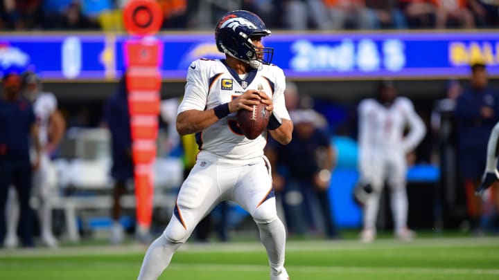 Dec 10, 2023; Inglewood, California, USA; Denver Broncos quarterback Russell Wilson (3) drops back to pass against the Los Angeles Chargers  during the first half at SoFi Stadium. Mandatory Credit: Gary A. Vasquez-USA TODAY Sports