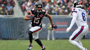 Nov 9, 2025; Chicago, Illinois, USA; Chicago Bears wide receiver Rome Odunze (15) makes a catch against New York Giants safety Jevon Holland (8) during the first half at Soldier Field. Mandatory Credit: Mike Dinovo-Imagn Images