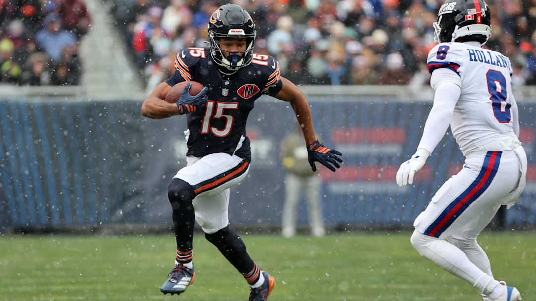 Nov 9, 2025; Chicago, Illinois, USA; Chicago Bears wide receiver Rome Odunze (15) makes a catch against New York Giants safety Jevon Holland (8) during the first half at Soldier Field. Mandatory Credit: Mike Dinovo-Imagn Images