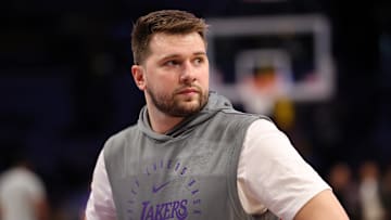 Apr 22, 2025; Los Angeles, California, USA; Los Angeles Lakers guard Luka Doncic (77) looks on before a game two of first round for the 2024 NBA Playoffs against the Minnesota Timberwolves at Crypto.com Arena. Mandatory Credit: Kiyoshi Mio-Imagn Images