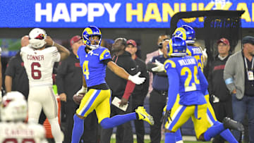 Dec 28, 2024; Inglewood, California, USA; Los Angeles Rams cornerback Ahkello Witherspoon (4) celebrates after an interception in the end zone against the Arizona Cardinals in the fourth quarter at SoFi Stadium. Mandatory Credit: Jayne Kamin-Oncea-Imagn Images