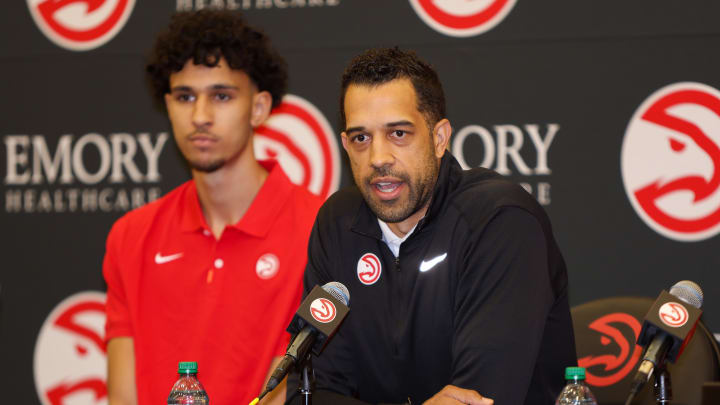 Jun 28, 2024; Atlanta, Georgia, USA; Atlanta Hawks general manager Landry Fields talks to the media with first overall pick Zaccharie Risacher at the Emory Sports Medicine Complex. Mandatory Credit: Brett Davis-USA TODAY Sports
