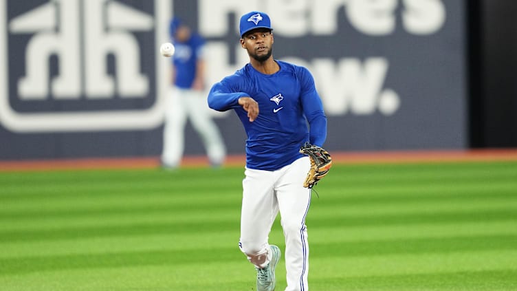 Apr 24, 2023; Toronto, Ontario, CAN; Toronto Blue Jays shortstop Otto Lopez (4) throws a ball to